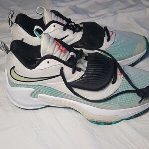 Nike Women’s White & Mint Green Athletic Sneakers with Black Accents